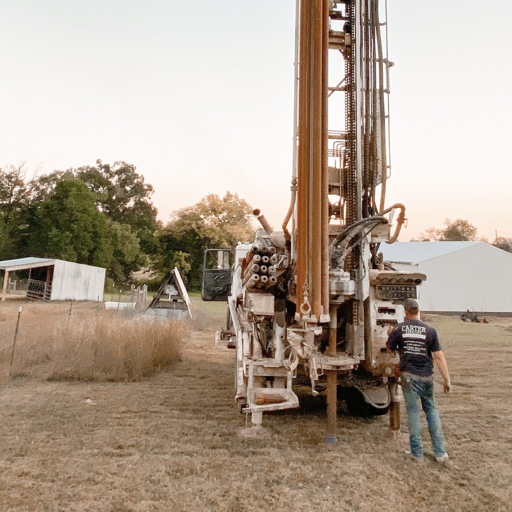 Water well drilling rig in Hounslow at work